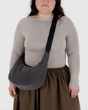 Medium Washed Denim Crescent Bag in Black from BAGGU