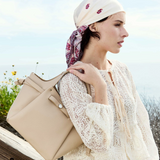 Avril Caramel Recycled Vegan Leather Top Handle Bag from Melie Bianco