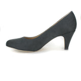 A simple black microsuede pump with a small covered heel. Almond toe shape. Beige lining.