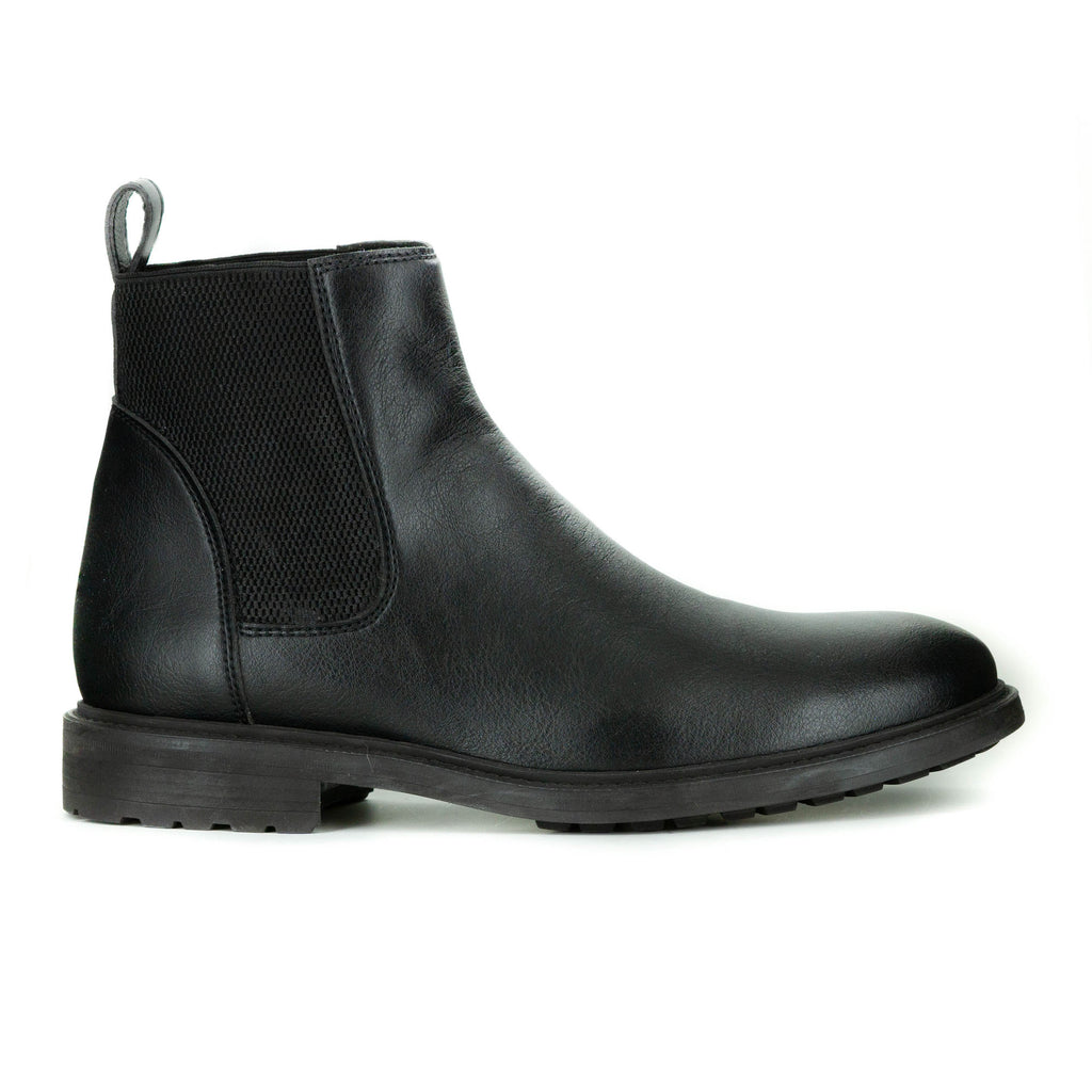 Men's chelsea style boot in black vegan leather. Elastic paneling on sides, pull tab in back, rubber sole with traction.
